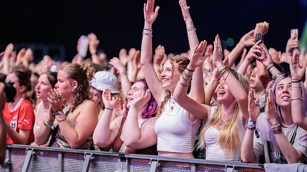 Sunset over Donauinsel with live music and food stalls at Donauinselfest