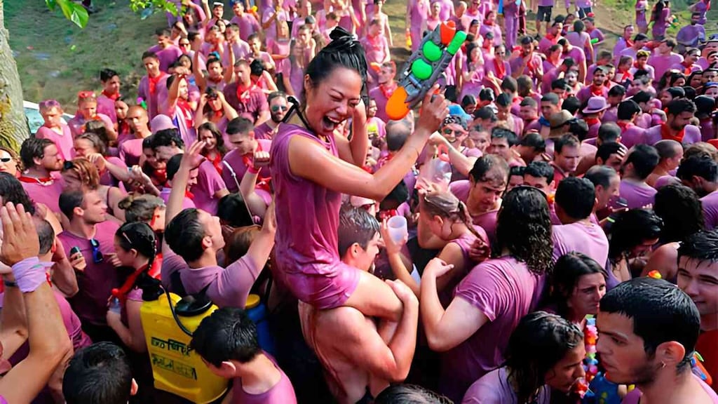Participants soaked in wine during the Battle of Wine