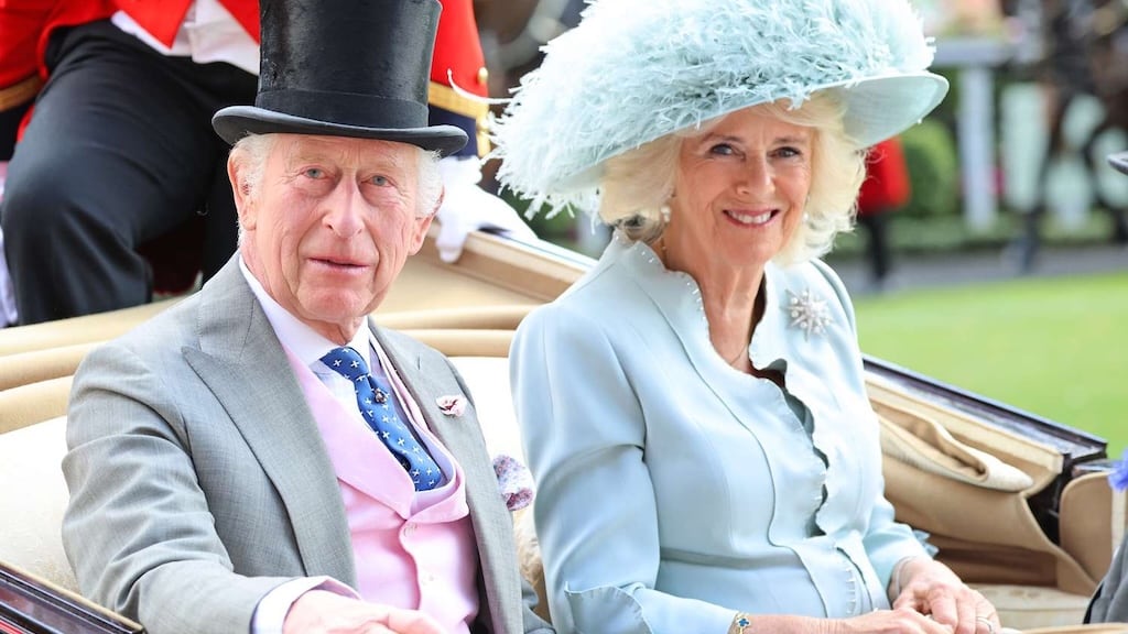 The Royal Procession with horse-drawn carriages entering Ascot Racecourse