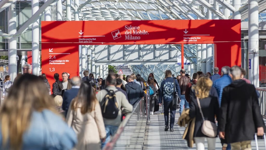 Professional attendees networking at the Milan Furniture Fair